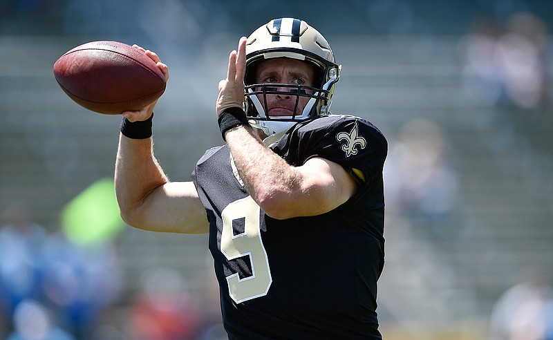 New Orleans Saints quarterback Drew Brees warms up before a preseason NFL football game against the Los Angeles Chargers Sunday, Aug. 18, 2019, in Carson, Calif. (AP Photo/Gregory Bull )
