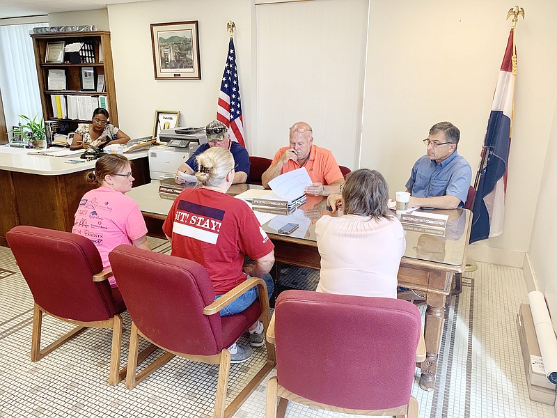 The Callaway County Commission met with the Callaway County Humane Society on Tuesday to discuss the county's funding of a spay and neuter program since 2017. Pictured in the back row are, from left, eastern district commissioner Randy Kleindienst; presiding commissioner Gary Jungermann and western district commissioner Roger Fischer. Pictured in the front row are, from left, humane society board member Mary Simpson; vice president Sandy Corbet and president Nancy Hickman.