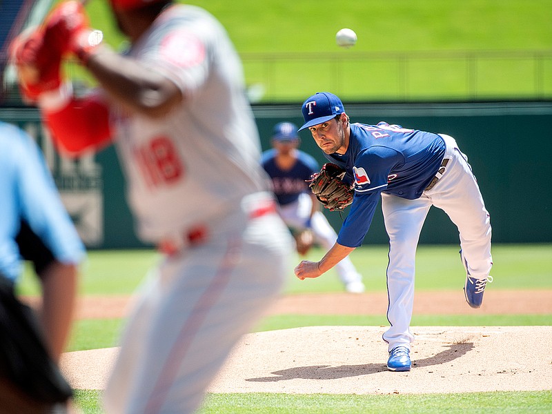 Texas Rangers starting pitcher Joe Palumbo works against Los Angeles Angels' Brian Goodwin (18) during the first inning of the first baseball game of a doubleheader Tuesday, Aug. 20, 2019, in Arlington, Texas. Los Angeles won 5-1. (AP Photo/Jeffrey McWhorter)