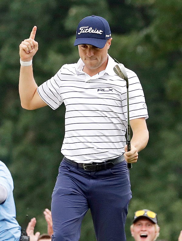 Justin Thomas celebrates after making a birdie on the 14th hole during Saturday's third round of the BMW Championship at Medinah Country Club in Medinah, Ill.