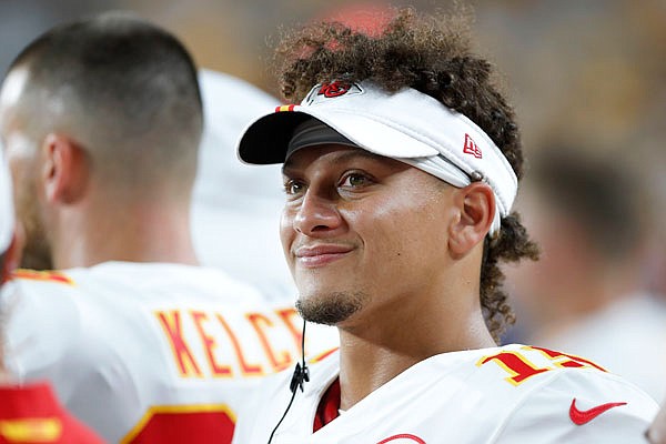 Chiefs quarterback Patrick Mahomes smiles on the sideline as his team plays against the Steelers in the first half of a preseason game Saturday in Pittsburgh.