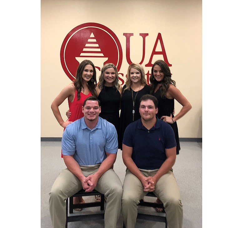 UA Cossatot recently held a pinning ceremony for graduates of the college's first Physical Therapy Assistant program. Shown are, front row from left, Kyle Duncan and Adam Bailey. In the back row are Jeanne Spain, Katy Worrell, Kylie Bowens and Mandy Mote. (Submitted photo)
