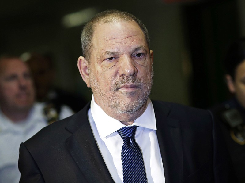FILE - In this Oct. 11, 2018, file photo, Harvey Weinstein enters State Supreme Court in New York. A lawyer for Weinstein has asked that the disgraced movie mogul's upcoming criminal trial be moved out of New York City, saying he can't get a fair trial. In a longshot motion filed with the state appellate court on Friday, Aug. 16, 2019, attorney Arthur Aidala suggested the trial be moved to upstate Albany County or Suffolk County on Long Island. (AP Photo/Mark Lennihan, File)
