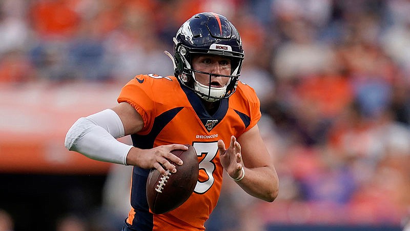 Broncos quarterback Drew Lock runs against the 49ers during Monday's preseason game in Denver.