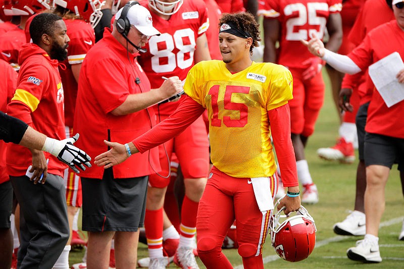 In this Aug. 2 file photo, Patrick Mahomes greets a teammate during Chiefs training camp in St. Joseph. Kansas City hosts San Franciso today in Week 3 of the preseason.