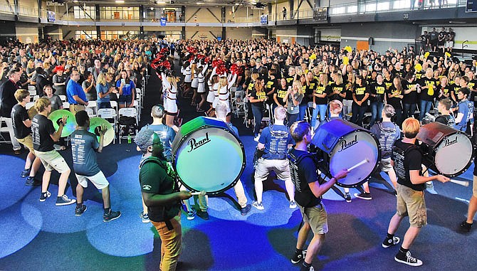 The lights were dimmed and the music loud as the Jefferson City School District hosted its open session Friday to get the staff motivated and excited for the start of the new school year. During the event at The Linc, the Jefferson City High School Drum Line, cheerleaders from both high schools and Capital City Dance Team performed. 