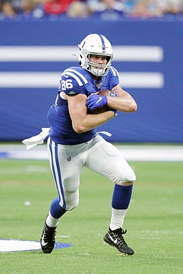 Colts tight end Hale Hentges wraps up the ball after making a catch in Saturday night's preseason game against the Bears in Indianapolis. Hentges (Helias High School) caught one pass for nine yards Saturday night in Colts' 27-17 loss. Hentges is tied for second on the Colts with five preseason receptions. The rookie free agent tight end from Alabama has totaled 53 yards on his catches.