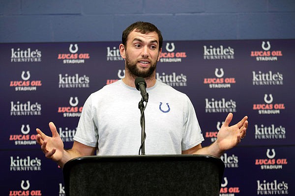 Andrew Luck speaks during a news conference announcing his retirement following Saturday night's preseason game between the Colts and the Bears in Indianapolis.