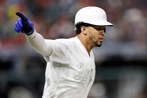 Cheslor Cuthbert of the Royals reacts after hitting a double during the sixth inning of Saturday night's game against the Indians in Cleveland.