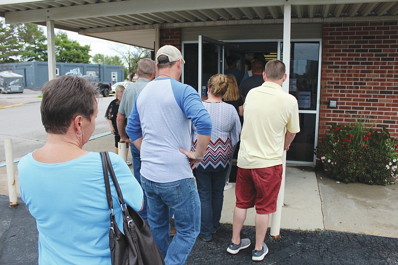 The line for entry to the Moniteau County Health Board special meeting on Monday, Aug. 26, 2019, extended into the parking lot.