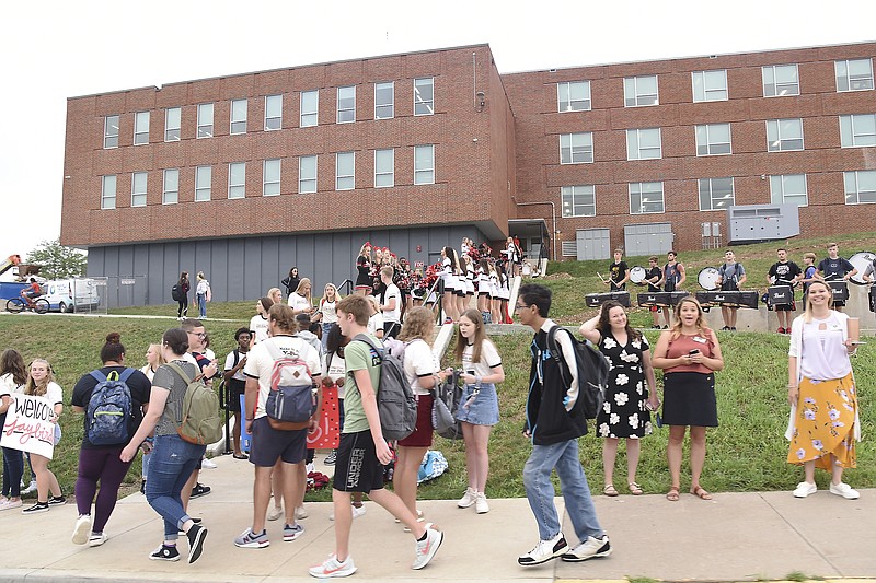 Students arriving at Jefferson City High School Tuesday for the first day of classes were greeted by STUCO members and the drum line as they entered the building's west side. Construction is ongoing so staff and students have to make adjustments but district officials are working hard to make sure things go as smooth as possible. 