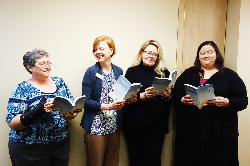 Members of the One Read Task Force show excitement the 2019 pick: Jessica Bruder's "Nomadland." Team members, from left, Angela Grogan, Lauren Williams, Angela Brown and Sara Henry have brainstormed a myriad of activities and talks for One Read.