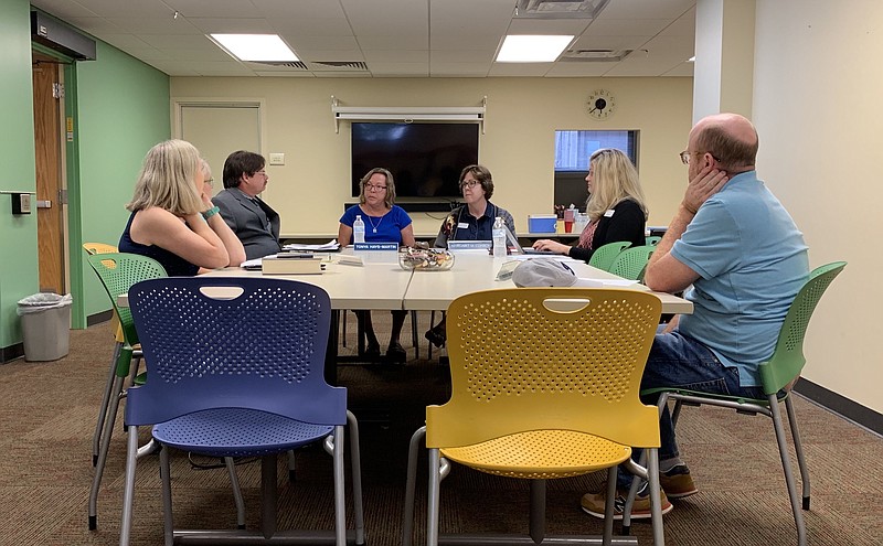 <p>Quinn Wilson/For the News Tribune</p><p>The Callaway County Library District board meets in the Friends Room at the Callaway County Public Library on Tuesday, Aug. 27, 2019, to set the district’s 2019 tax rate and discuss the coming April 2020 tax levy. Pictured, from left, are board members Mary Fennel and Jean Howard, Daniel Boone Regional Library CFO Jim Smith, DBRL Executive Director Margaret Conroy, board President Tonya Hays-Martin, executive assistant Amanda Burke and board member Brian Warren.</p>