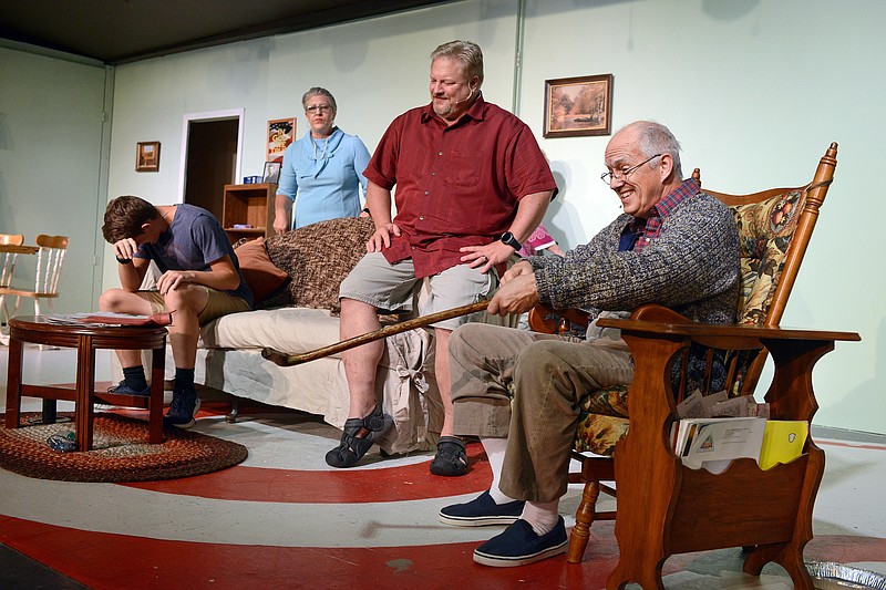 Sally Ince/ News Tribune
Actor Mark Howard, front right, slaps his cane while he tells a joke Tuesday August 27, 2019 as he plays Pap during a rehearsal for "Pap's Place" at Stained Glass Theater. Opening night for "Pap's Place" will be held on September 5 beginning at 7:30 pm. 