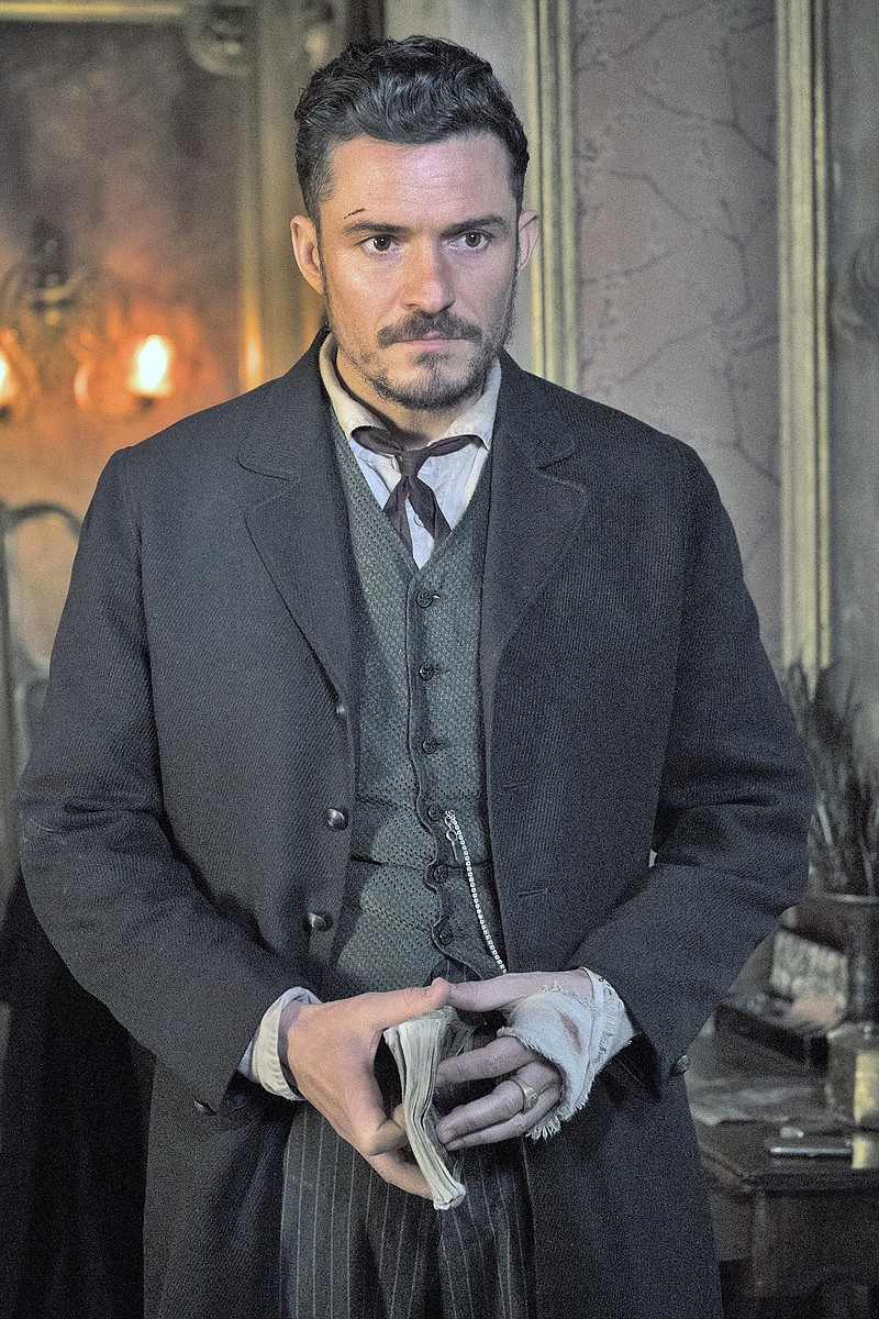 Orlando Bloom plays a detective trying to solve a series of vicious crimes in the Victorian era in Amazon Prime's new series, "Carnival Row," premering Friday. (Jan Thijs/Handout/TNS)