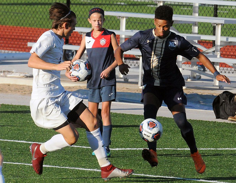 Isaac Johnson of Helias controls the ball during a game against Borgia last season at the Crusader Athletic Complex.