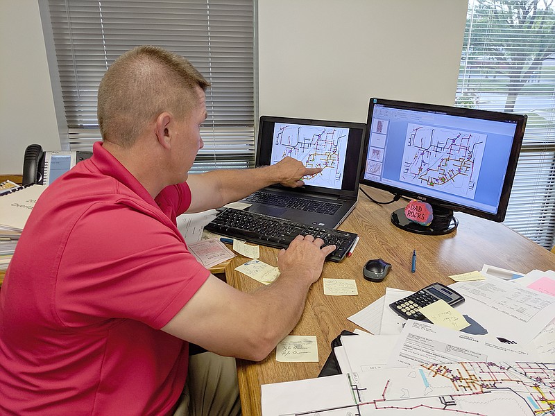 Interim city engineer Kyle Bruemmer points out problem areas of the sewer system. Thanks to saving money on another major project, the City of Fulton has dough left over to make much-needed repairs throughout the system.