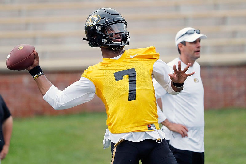 Kelly Bryant throws as offensive coordinator Derek Dooley stands off to the side during practice earlier this month on Faurot Field. Bryant has not played in a college football game since Sept. 29, 2018, against No. 15 Syracuse.