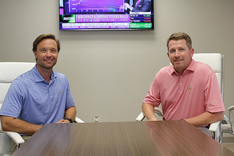 Josh Andrus, left, and Greg Flanagan, financial advisers with Flanagan/Andrus, have been recognized as top performers by Forbes.