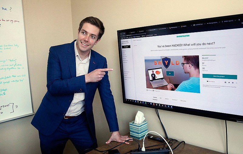 Tyler Olson poses in his office at the University of St. Thomas on Aug. 27 in Minneapolis. Olson is starting a cybersecurity company, Shyld.