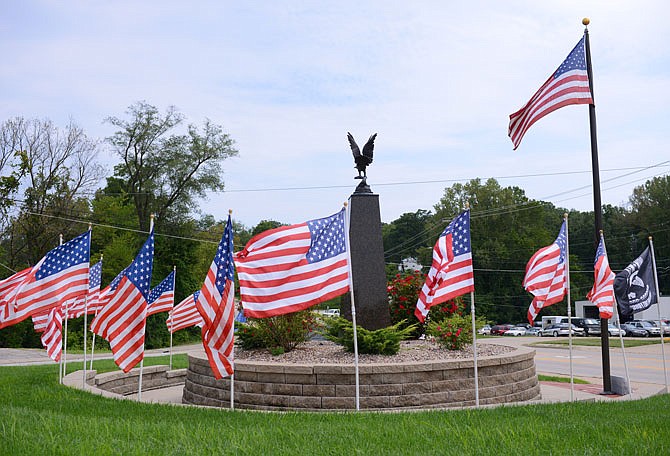 Flags are displayed to commemorate the Sept. 11 anniversary at the Freedom Corner, located at the intersection of East High and McCarty streets.