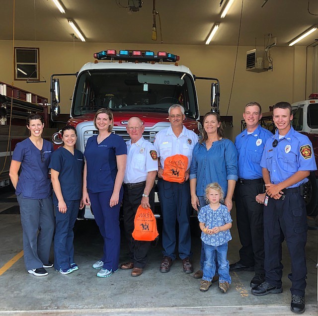 from left to rightDr. Melissa Boldan, Dr. Jessica Kolish, Dr. Ashley French, Chief Butch Braun, Assistant Chief Keith Buscher, Julie Braun, Lana Braun, Firefighter Kyle Renick, and Firefighter Austin Buscher.