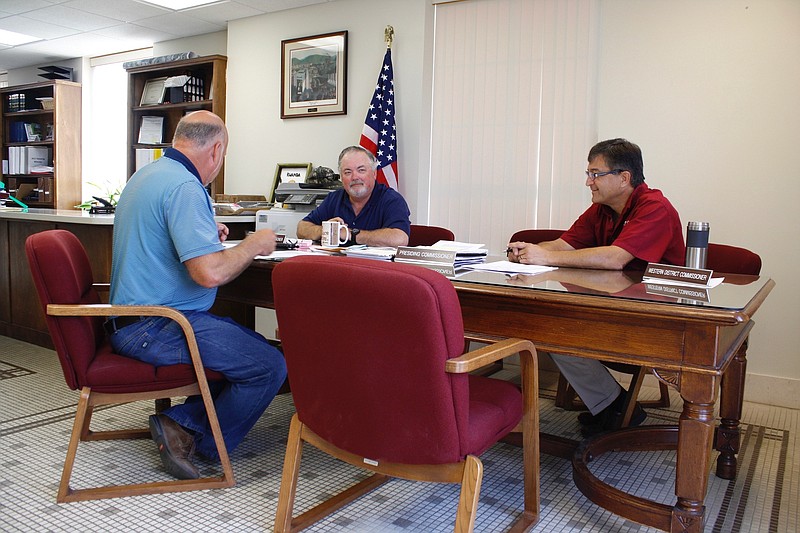 <p>Quinn Wilson/For the News Tribune</p><p>The Callaway County Commission unanimously approved the lowered 2019 tax levies for general revenue and roads and bridges on Tuesday, Sept. 10, 2019. Pictured, from left, are Presiding Commissioner Gary Jungermann, Eastern District Commissioner Randy Kleindienst and Western District Commissioner Roger Fischer.</p>