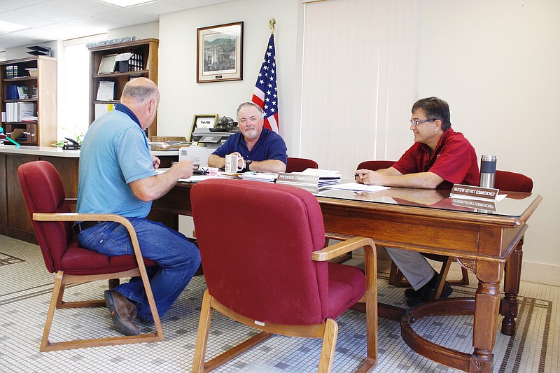 The Callaway County Commission unanimously approved the lowered 2019 tax levies for general revenue and roads and bridges. Pictured, from left, are Presiding Commissioner Gary Jungermann, Eastern District Commissioner Randy Kleindienst and Western District Commissioner Roger Fischer.