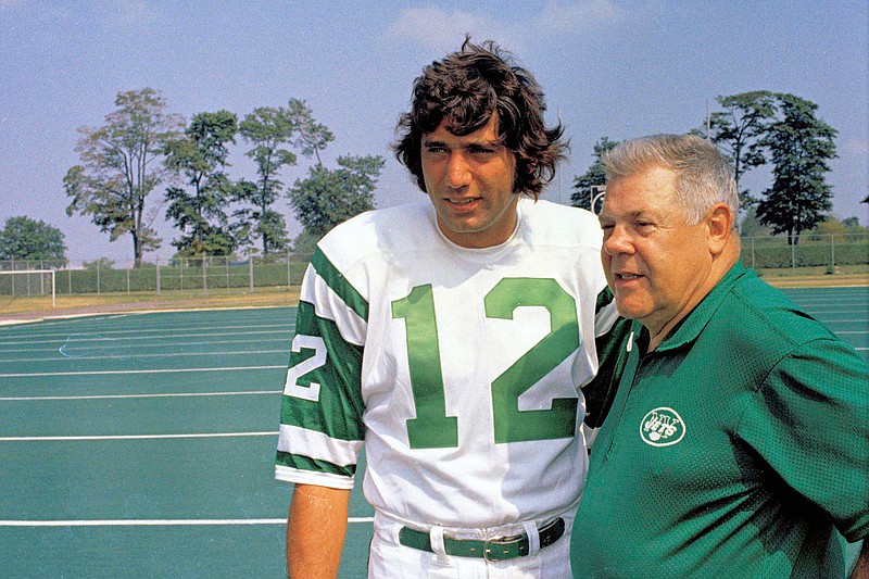 This is an undated photo showing Joe Namath, left, quarterback for the New York Jets, talking with head coach Weeb Ewbank during football practice session in 1970. As part of its celebration of its 100th season, the NFL is designating a Game of the Week, each chosen to highlight a classic matchup. For Week 2, it is the Monday night game between the Browns and Jets.  Joe Namath and Leroy Kelly were supposed to be the offensive stars in the inaugural game of pro football's prime-time telecasts. But the guys who moved the ball best were the guys in the striped shirts. The guys in the striped shirts _ the officiating crew headed by Norm Schacter _ moved the ball so well that they played a key role in Cleveland's 31-21 victory and may have played a key role in the important ratings battle against Liz, Dick and Lucy.(AP Photo/File)