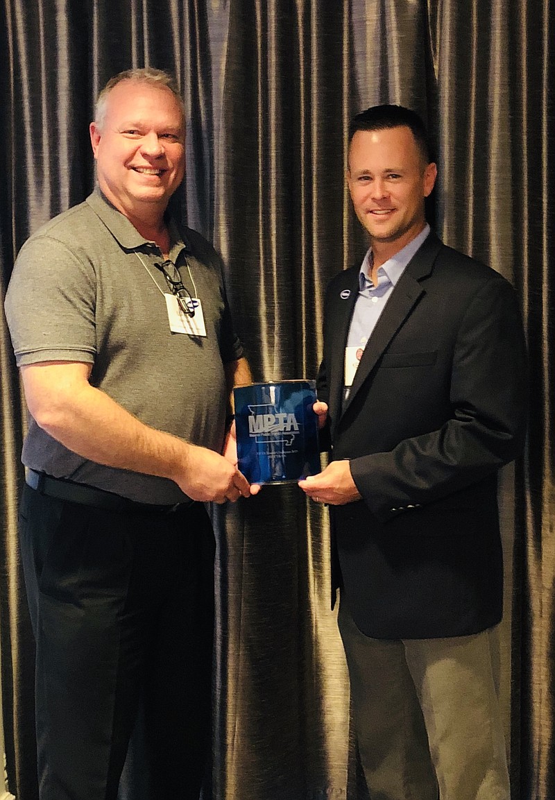 <p>Submitted</p><p>Jefferson City Transit Director Mark Mehmert accepts the 2019 Transit Champion Award for JeffTran from Kelly Turner, president of the Missouri Public Transit Association’s Board of Directors.</p>