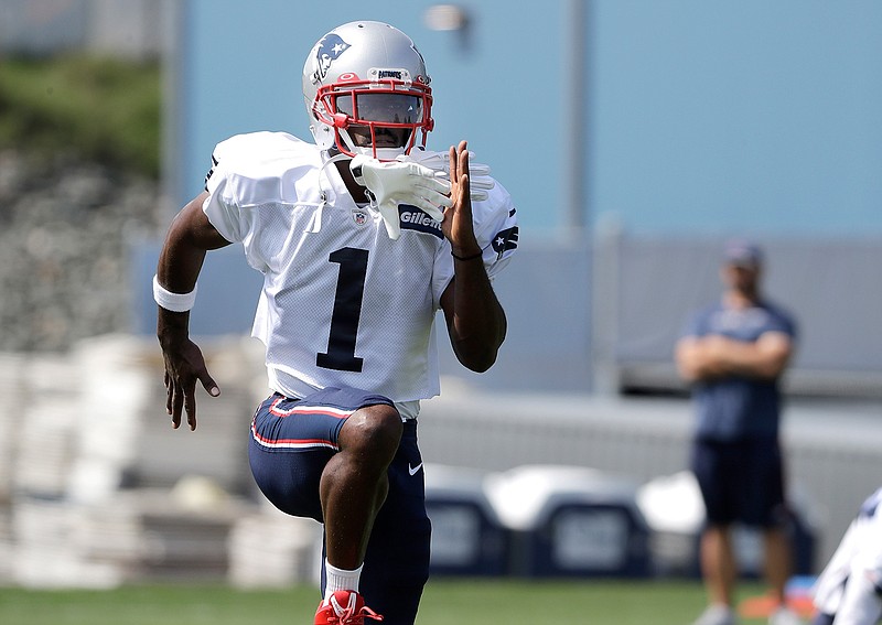 New England Patriots wide receiver Antonio Brown works out during NFL football practice, Wednesday, Sept. 11, 2019, in Foxborough, Mass. Brown practiced with the team for the first time on Wednesday afternoon, a day after his former trainer filed a civil lawsuit in the Southern District of Florida accusing him of sexually assaulting her on three occasions.  
(AP Photo/Steven Senne)