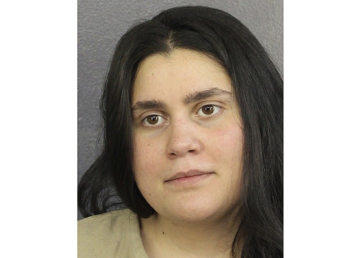 This undated booking photo from the Broward County Sheriff's Office, shows Sherry Tina Uwanawich. The South Florida woman who claimed to be a psychic fortune teller was sentenced last week in Miami to three years and four months in prison for taking $1.6 million from a Texas woman to remove a curse from her family. (Broward County Sheriff's Office via AP)