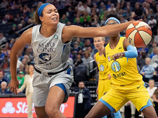 Minnesota Lynx forward Napheesa Collier keeps the ball from going out of bounds during the first half of the team's game last month against the Chicago Sky in Minneapolis.