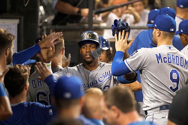 Jorge Soler is congratulated in the Royals dugout after hitting a two-run home run in the top of the eighth inning of Wednesday night's game against the White Sox in Chicago.