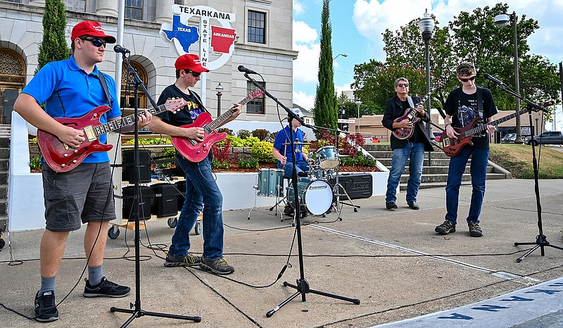 Terry Train performs Wednesday morning in downtown Texarkana.
