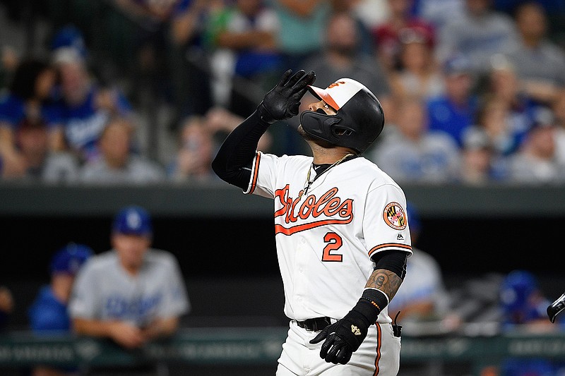 Baltimore Orioles' Jonathan Villar celebrates his three-run home run during the seventh inning of the team's baseball game against the Los Angeles Dodgers, Wednesday, Sept. 11, 2019, in Baltimore. Villar connected for the 6,106th homer in the majors this season. That topped the mark of 6,105 set in 2017. The Orioles won 7-3. (AP Photo/Nick Wass)