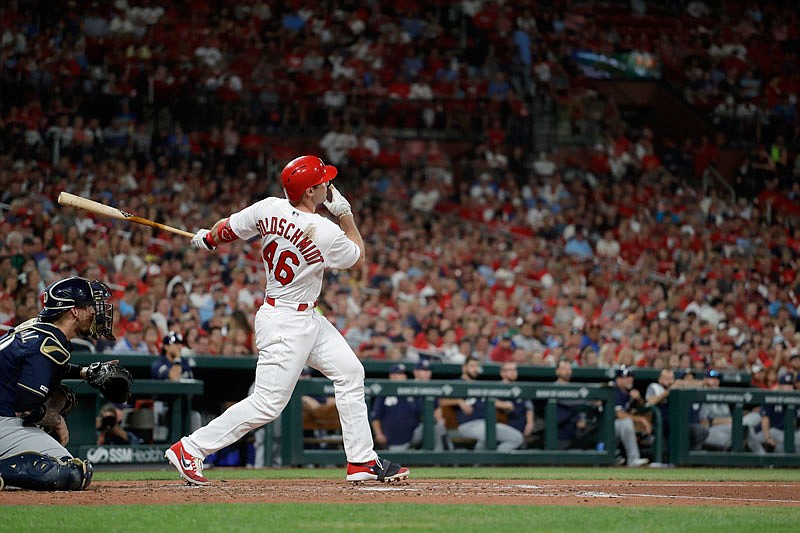 Paul Goldschmidt watches his grand slam fly during the third inning of Friday's game against the Brewers at Busch Stadium. Goldschmidt hit two home runs and drove in seven runs in the Cardinals' 10-0 win.