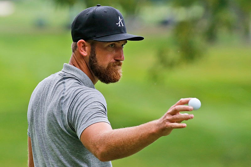 Kevin Chappell tips his ball to the crowd on the ninth hole Friday during the second round of A Military Tribute at The Greenbrier in White Sulphur Springs, W.Va.