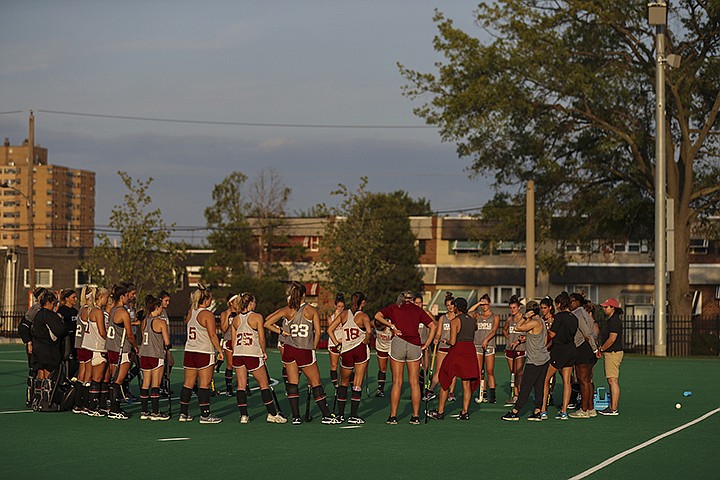 The Temple field hockey team gathers at the conclusion of their practice at Howarth Field in Philadelphia, Tuesday, Sept. 10, 2019. The team's game at Kent State on Saturday against Maine was cancelled due to pregame football fireworks. After the shock wore off of halting a women's field hockey game in the middle of overtime just so they could shoot off fireworks for a football game that hadn't even started, the captain of the Maine team said it's par for the course when you're a female athlete. Indeed, for all the advances created by Title IX, there's still an awful lot of hearts and minds that still need changing.(Heather Khalifa/The Philadelphia Inquirer via AP)