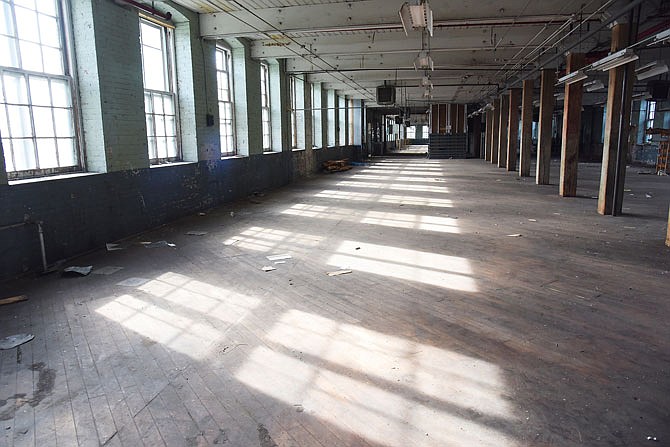 The old International Shoe Factory building has new owners. Holly and Nathan Stitt didn't want to pass up the opportunity to purchase the building and have already begun work on it. This is the south-facing side of the third floor. Each of the five floors contain more than 12,000 square feet of space for them to develop.