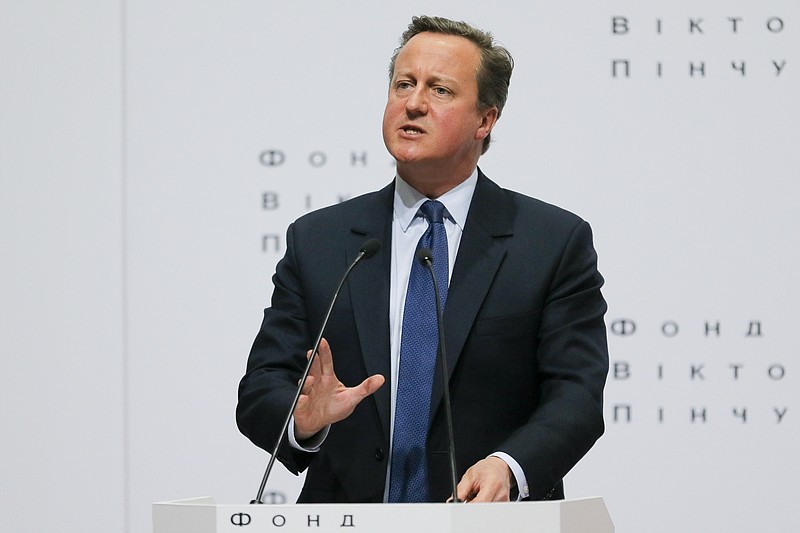 FILE - In this Wednesday, March 29, 2017 file photo Britain's former Prime Minister David Cameron gestures as he delivers a public lecture "Ukraine's Place in a changing world" at the Institute of International Relations of the National University in Kiev, Ukraine. David Cameron said in an interview published Saturday that he thinks about the consequences of the Brexit referendum “every single day” and worries “desperately” about what will happen next. (AP Photo/Efrem Lukatsky,file)