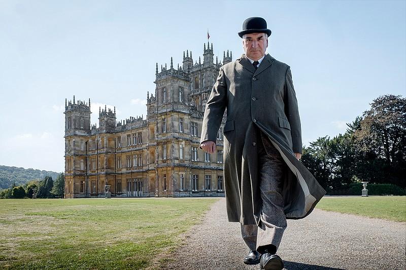 This image released by Focus features shows Jim Carter as Mr. Carson in a scene from "Downton Abbey." The highly-anticipated film continuation of the "Masterpiece" series that wowed audiences for six seasons, will be released Sept. 13, 2019, in the United Kingdom and on Sept. 20 in the United States. (Jaap Buitendijk/Focus Features via AP)