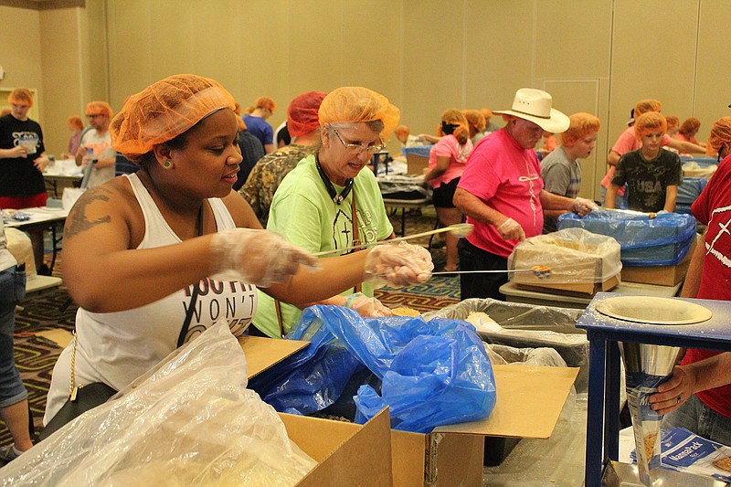 More than 600 volunteers showed up Saturday to assemble mobile packs for the Christian charity Feed My Starving Children. The charity is the mission of choice for the founders of Tacos 4 Life.
