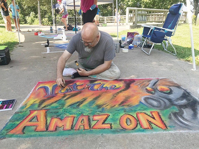 Rodger Francis entered the professional division of the Capital Chalk Art Fair on Sunday, Sept. 15, 2019, not to win but to make a statement with his "Visit the Amazon" piece. Francis has been an artist since the mid-1980s.