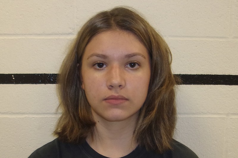 This undated photo provided by the Pittsburg County Sheriff's Office in McAlester, Okla. shows Alexis Wilson. Pittsburg County Sheriff Chris Morris said Wilson was arrested Monday, Sept. 16, 2019, after investigators saw a video of her shooting an AK-47 and her co-workers reported she had said she would "shoot up" the school. (Pittsburg County Sheriff's Office via AP)