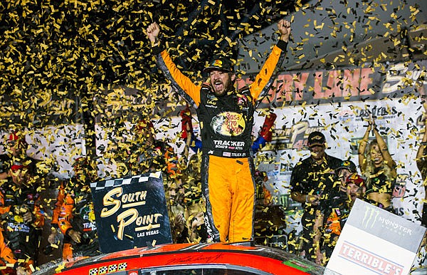 Martin Truex Jr. celebrates Sunday night after winning the NASCAR Cup Series race at the Las Vegas Motor Speedway in Las Vegas.