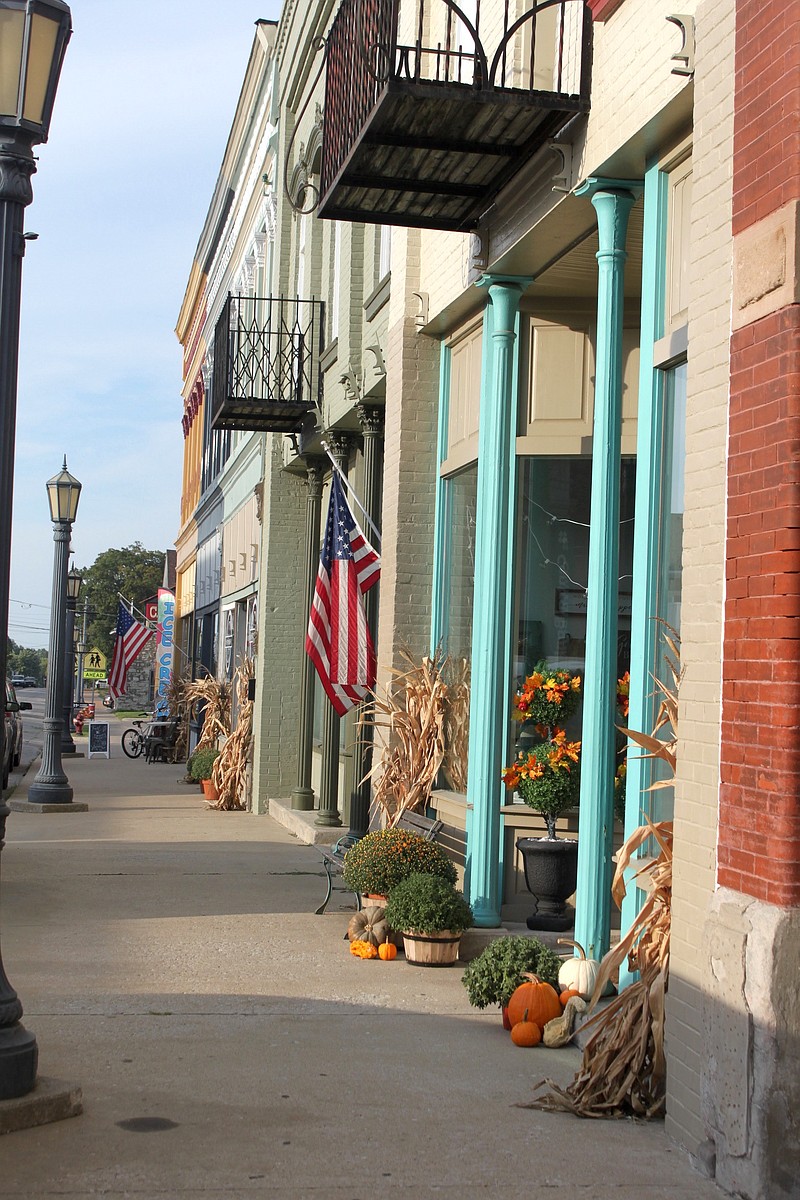 Fall decorations line the entryways along the Oak Street shops in this September 2019 photo, readying customers for the next season of sales and adventure.