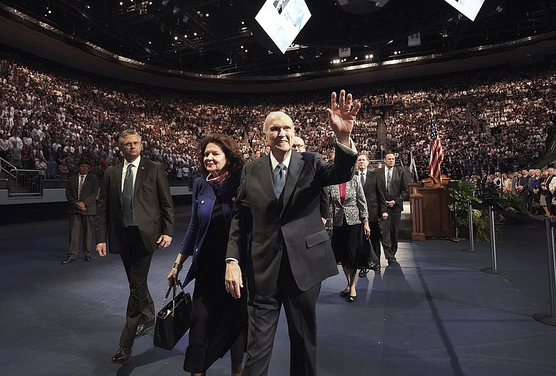 Russell M. Nelson, president of The Church of Jesus Christ of Latter-day Saints,  and his wife Sister Wendy Nelson wave to students after a devotional at Brigham Young University in Provo, Utah, Tuesday, Sept. 17, 2019. Nelson reaffirmed Tuesday the religion’s opposition to gay marriage by explaining that he and fellow leaders have a duty to teach God’s law that says marriage is restricted to man-woman unions.  (Jeffrey D. Allred/The Deseret News via AP)