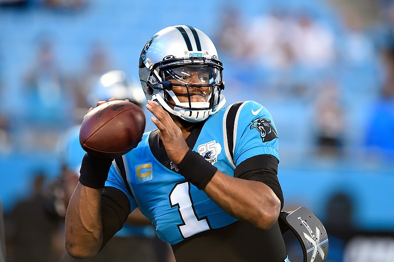 Carolina Panthers quarterback Cam Newton warms up Thursday before a game against the Tampa Bay Buccaneers in Charlotte, N.C