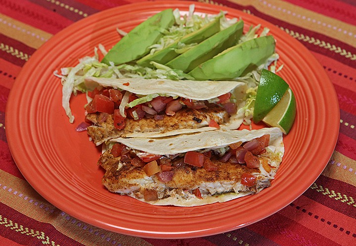 Linda Gassenheimer's Quick Fix Fish Tacos with Avocado Salad. (Linda Gassenheimer/TNS)